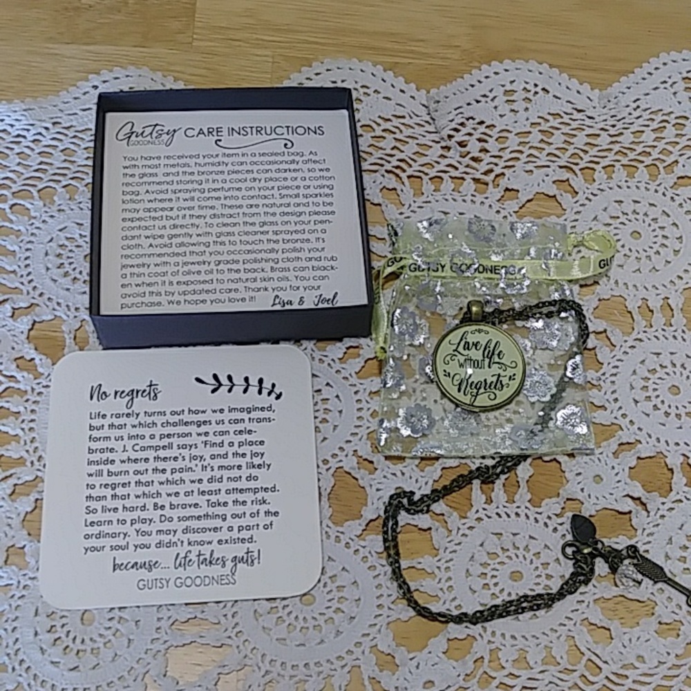 Antiqued look necklace with pretty carry bag and box